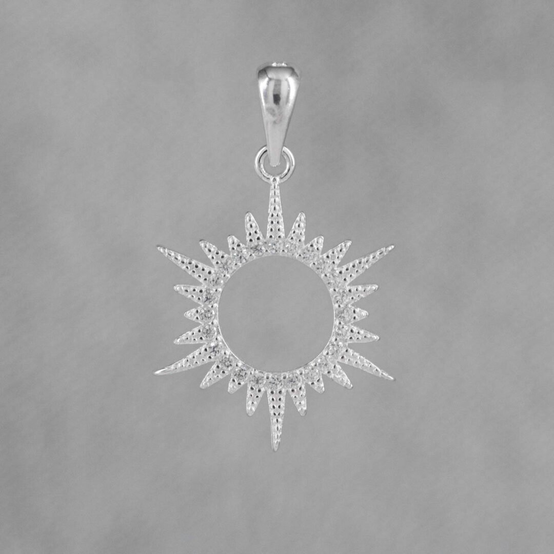 DIJE SOL CENTELLA CIRCONES