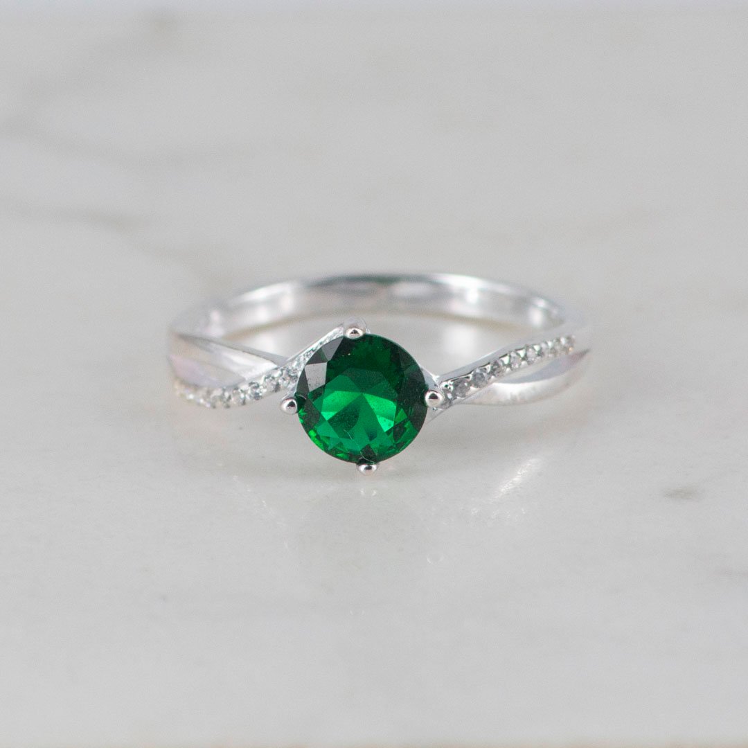 ANILLO SOLITARIO CRUZADO CIRCON VERDE