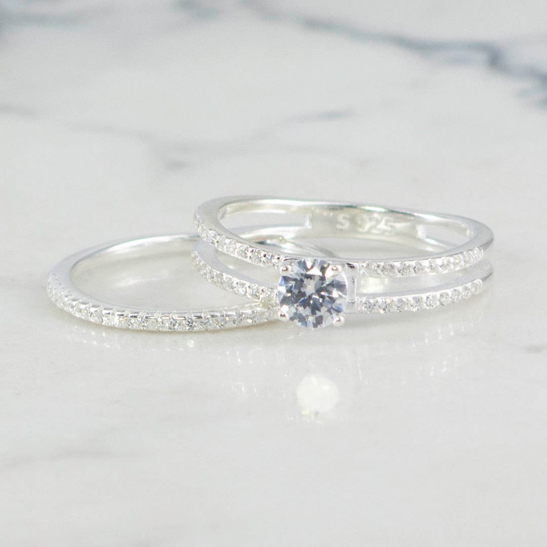 DUO DE ANILLOS SOLITARIO 2 BANDAS Y CIRCONES